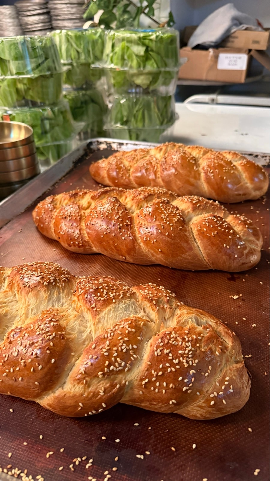 Fresh challah loaves in the 19 Cleveland kitchen
