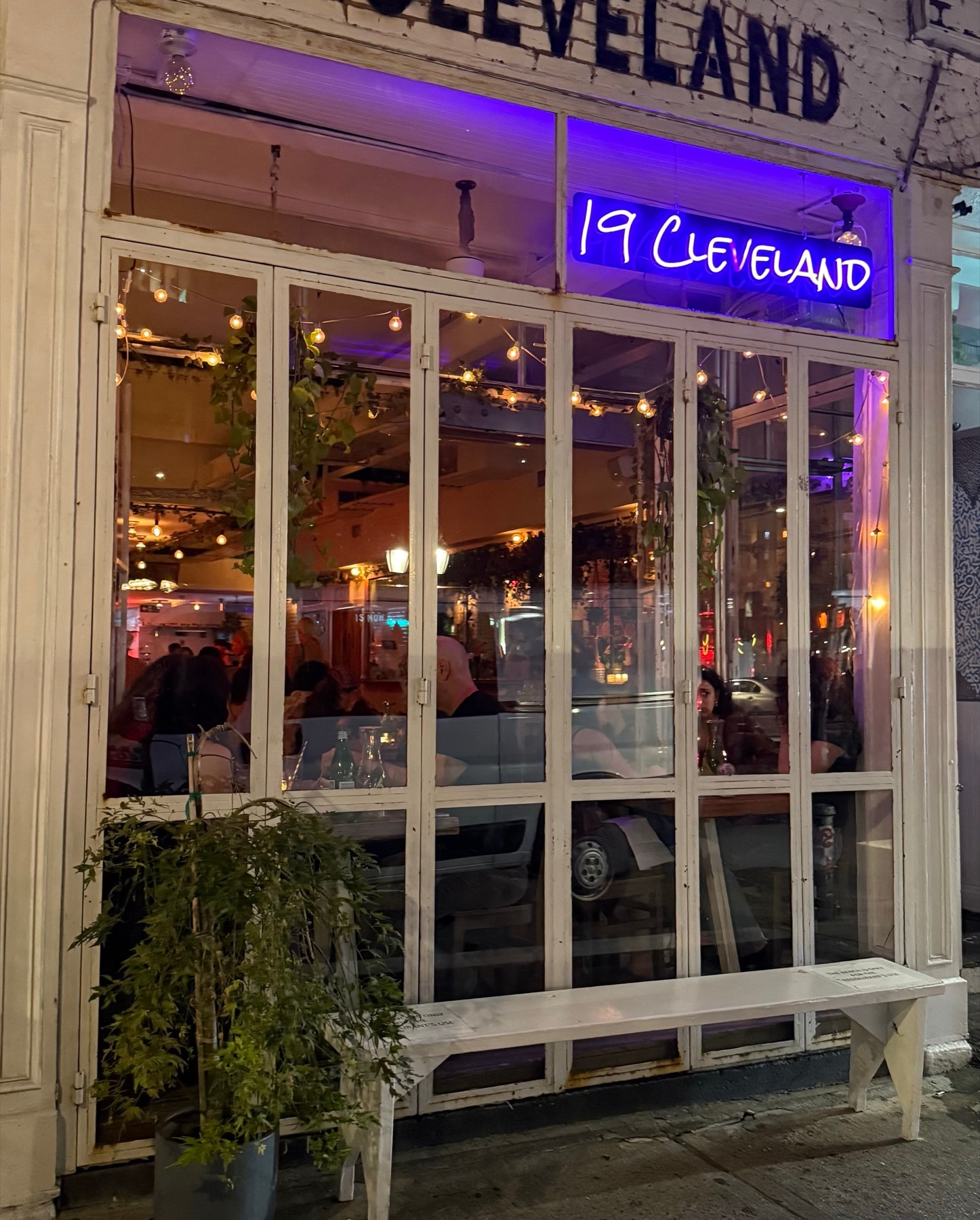 The 19 Cleveland storefront glowing at night