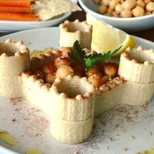 there is a plate of food with a castle on it