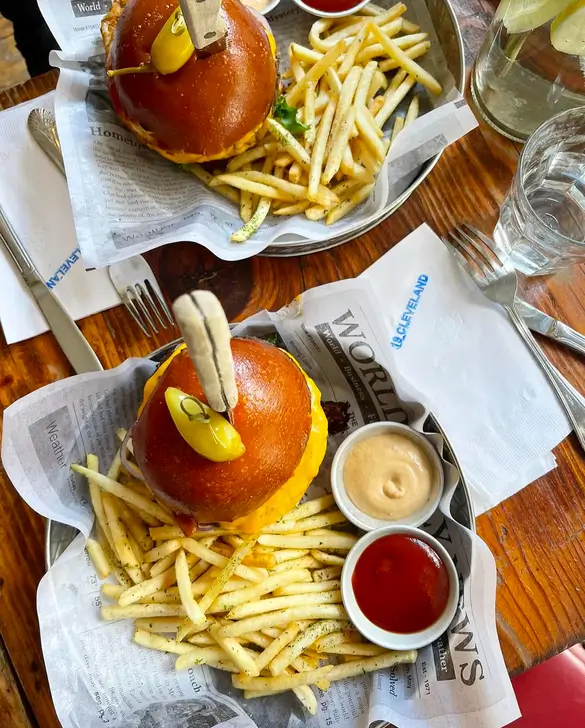 two plates of food on a table with a fork and a knife