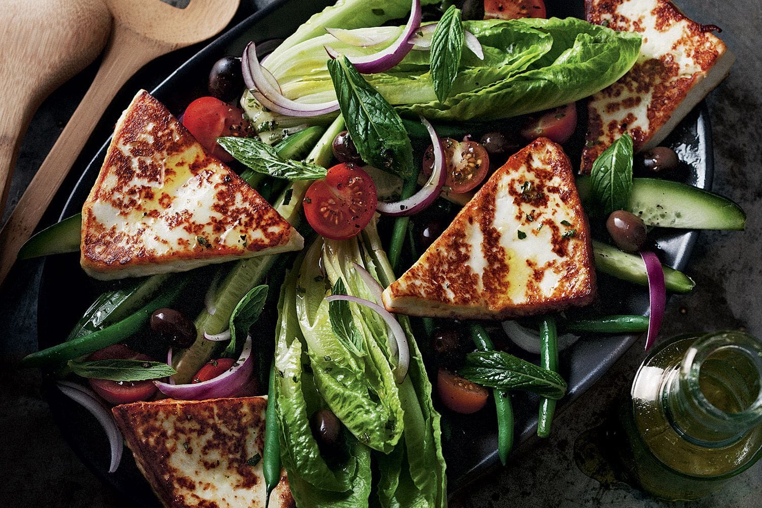 there is a plate of food with tofu and vegetables on it